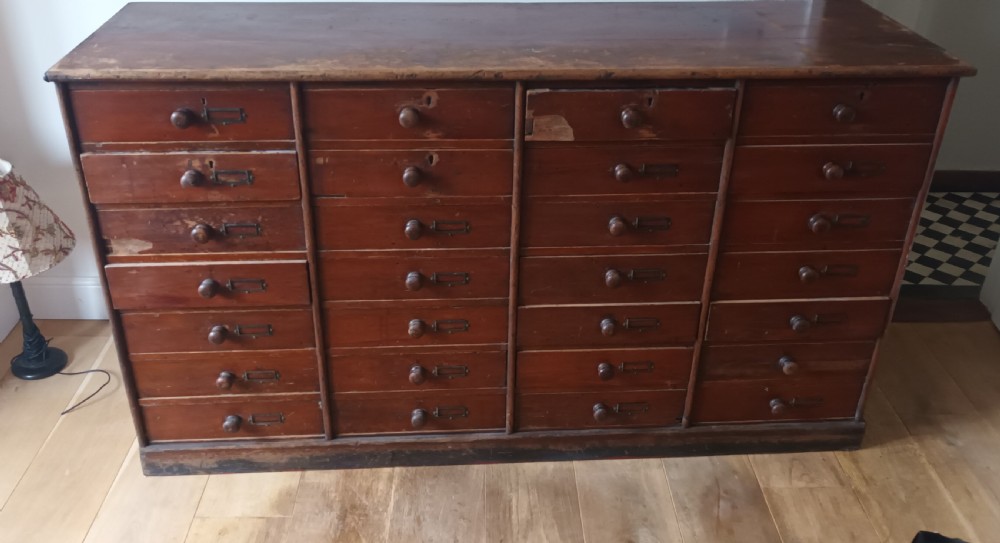 Large bank of office drawers. 