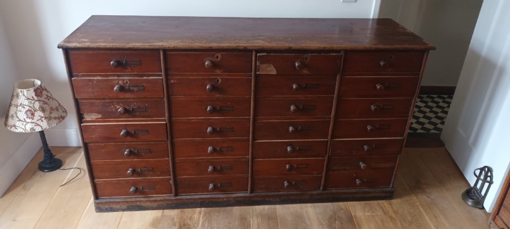 Large bank of office drawers.  View III