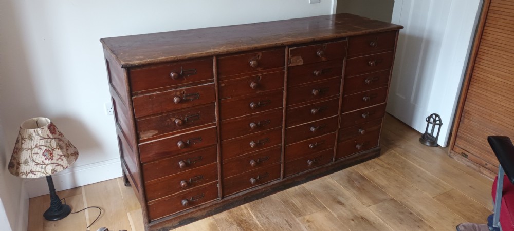 Large bank of office drawers.  View X