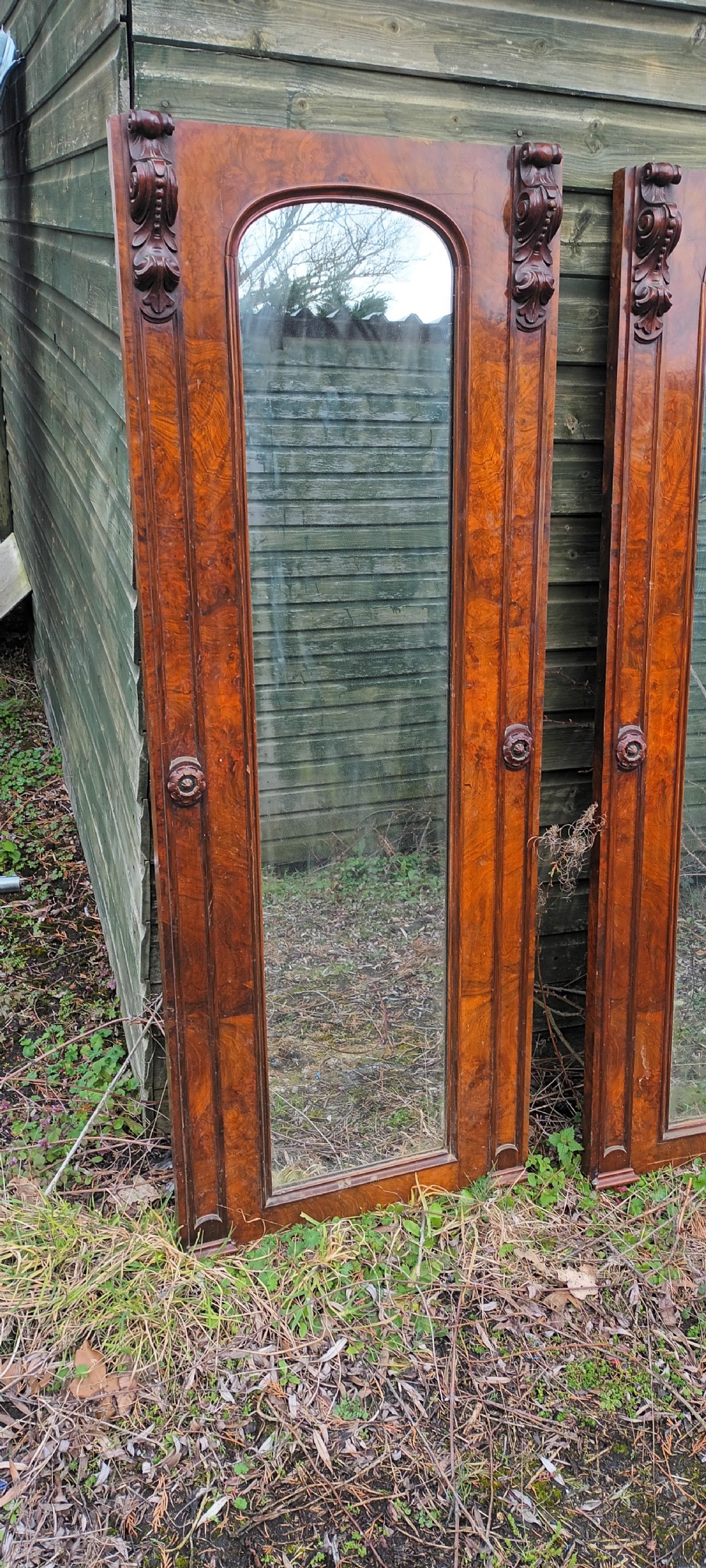 Pair of Victorian walnut hall mirrors.  View II
