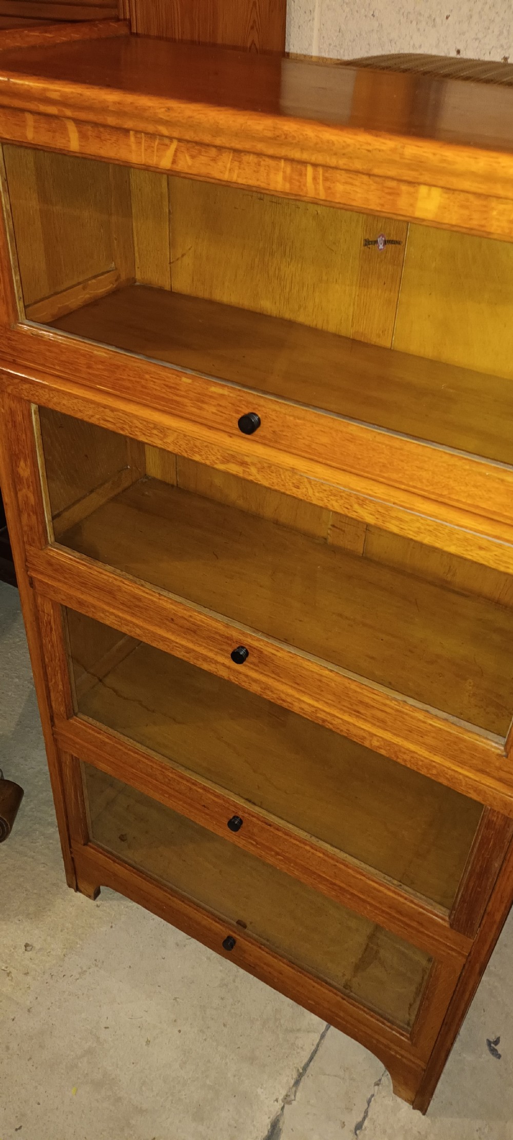 Golden oak 4 section globe Wernicke style cabinet.  View VI