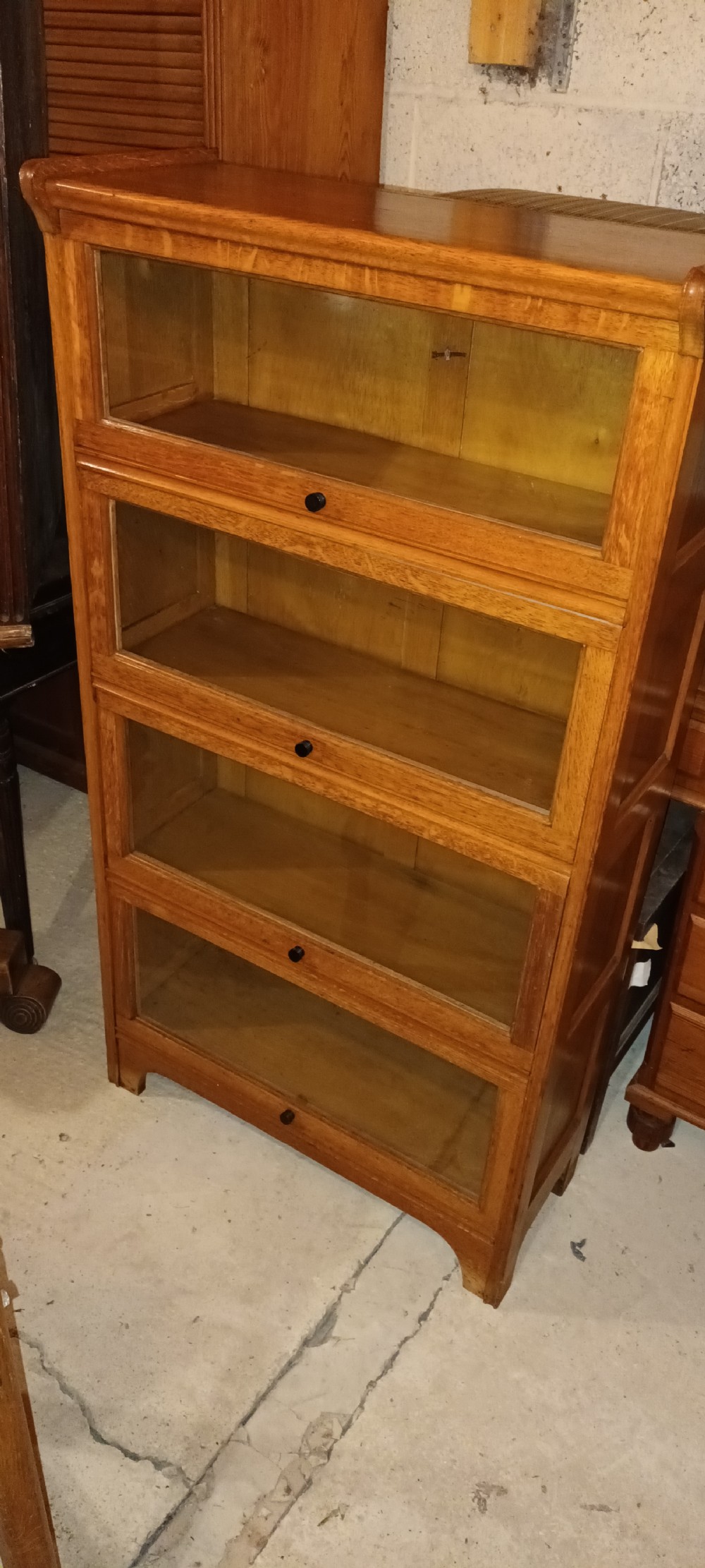 Golden oak 4 section globe Wernicke style cabinet.  View VII
