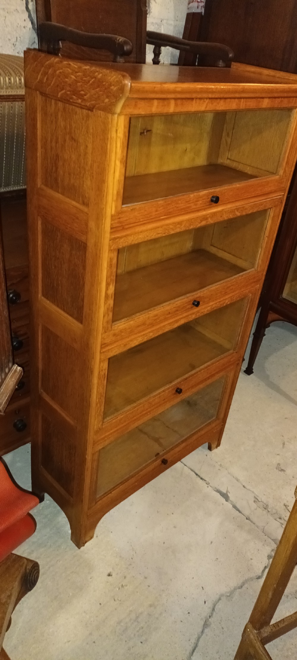 Golden oak 4 section globe Wernicke style cabinet.  View VIII