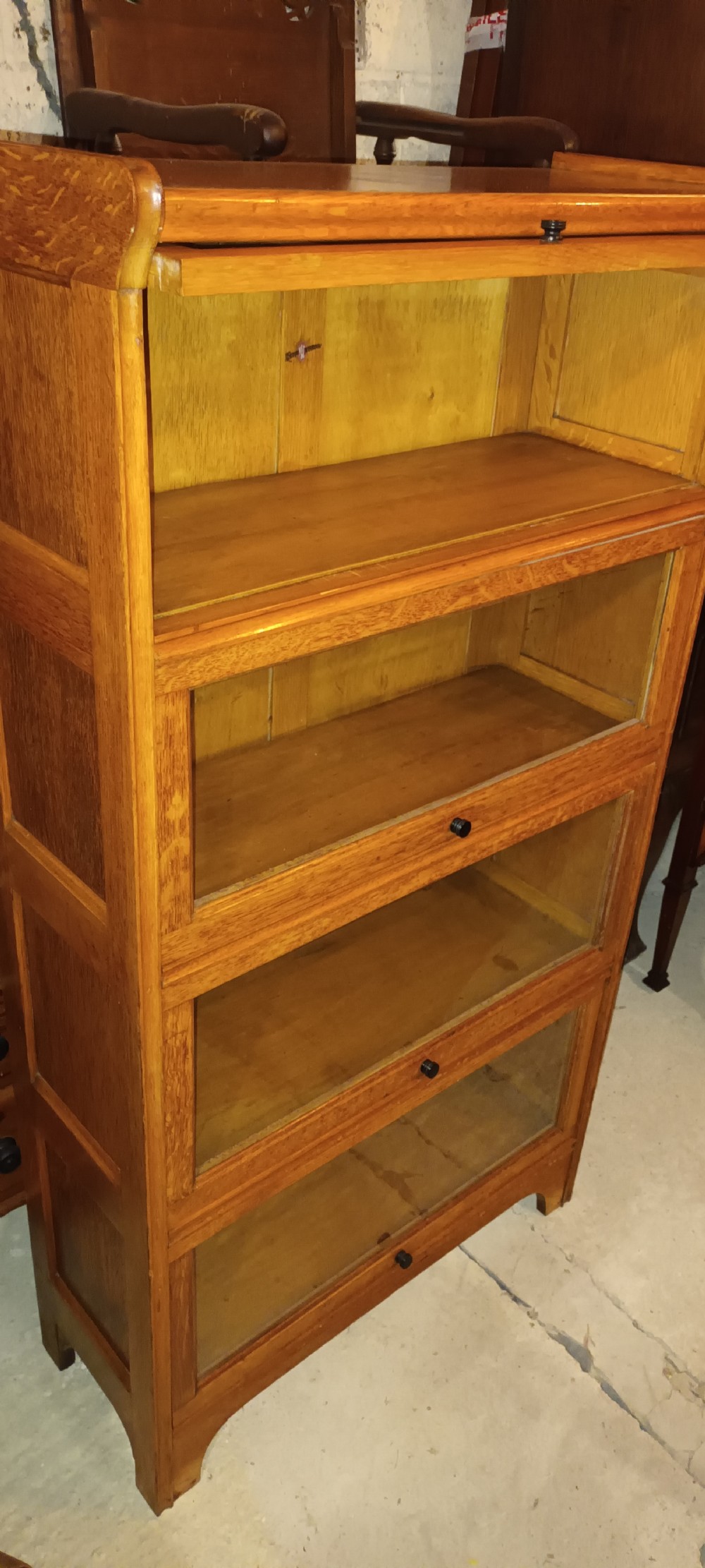Golden oak 4 section globe Wernicke style cabinet.  View IX