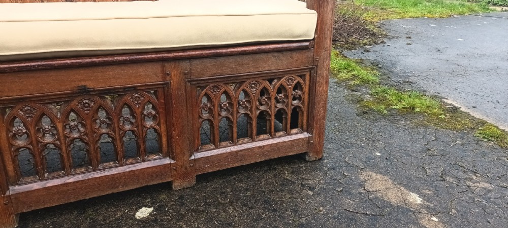 Antique carved oak gothic hall seat. View III