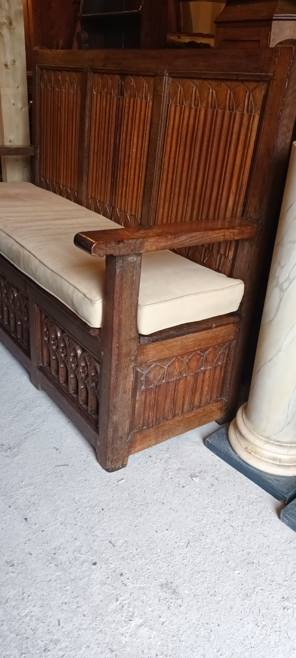 Antique carved oak gothic hall seat. View VII