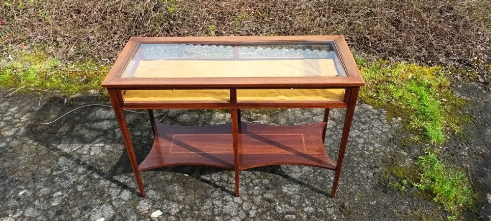 Unusual double inlaid mahogany bijouterie display table.