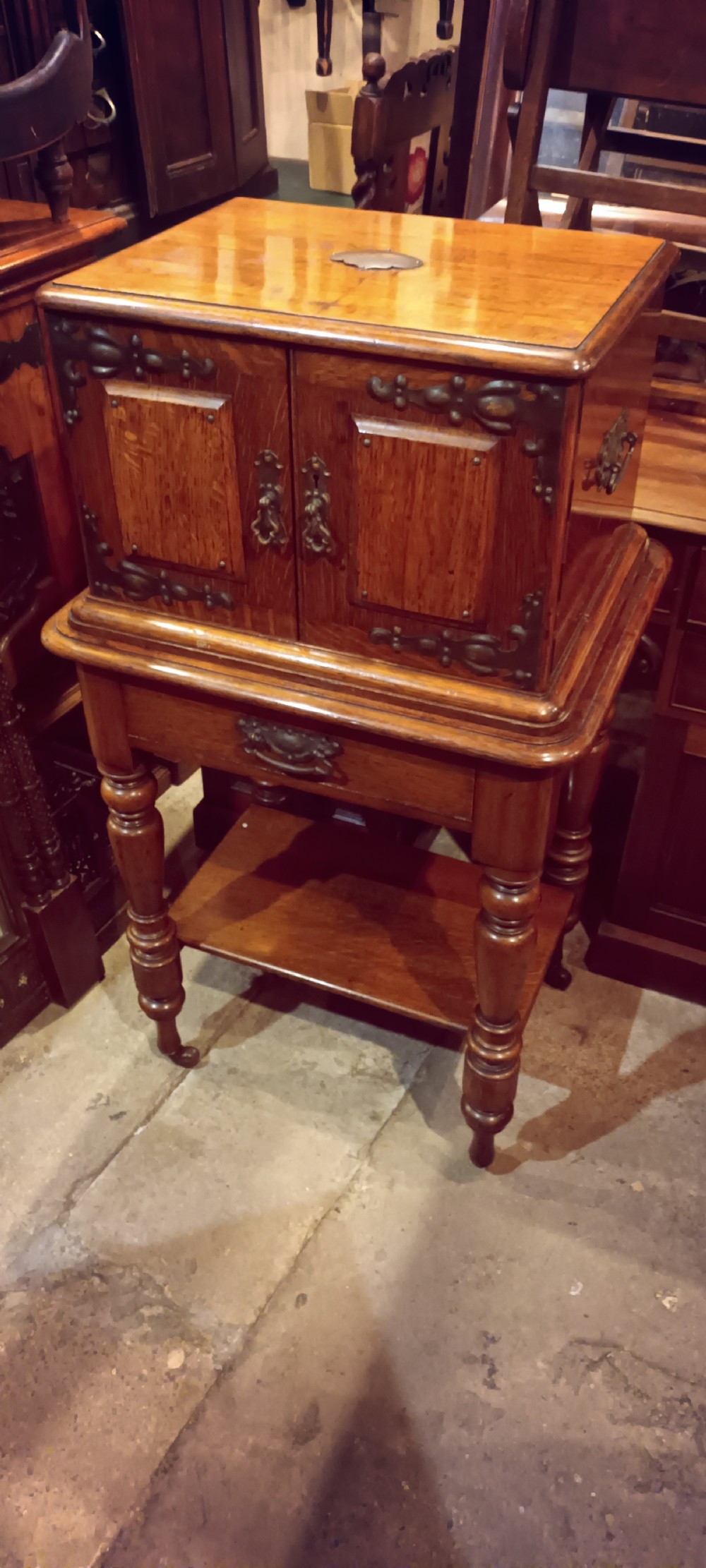 Late Victorian oak fitted cutlery cabinet with some cutlery. By Walker & Hall. View II