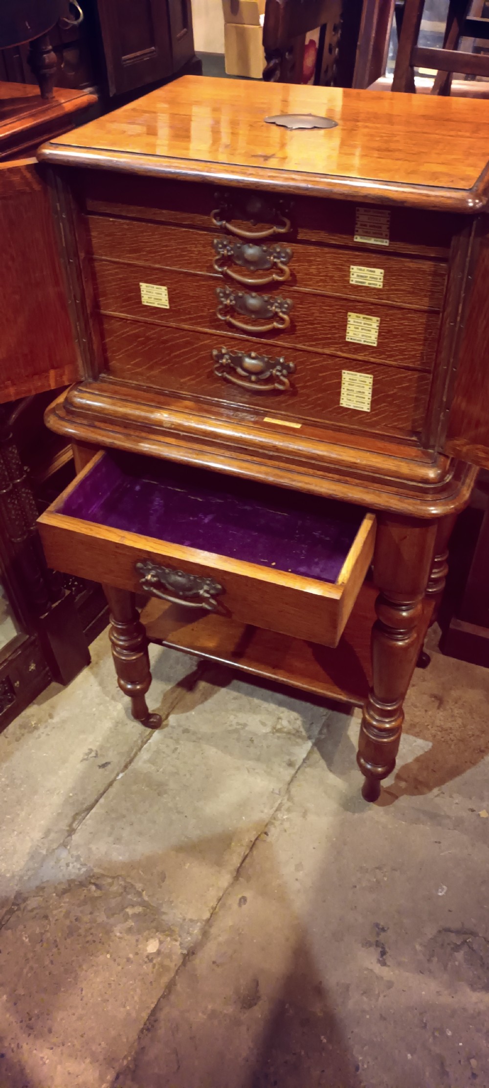 Late Victorian oak fitted cutlery cabinet with some cutlery. By Walker & Hall. View III