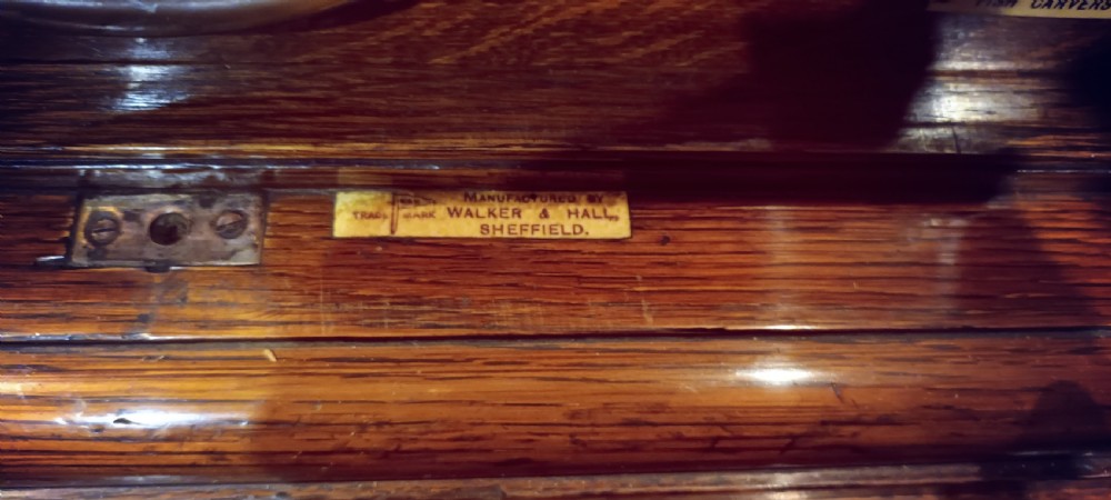 Late Victorian oak fitted cutlery cabinet with some cutlery. By Walker & Hall. View V