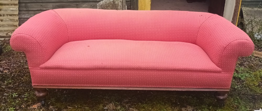 Victorian country house upholstered Chesterfield sofa.