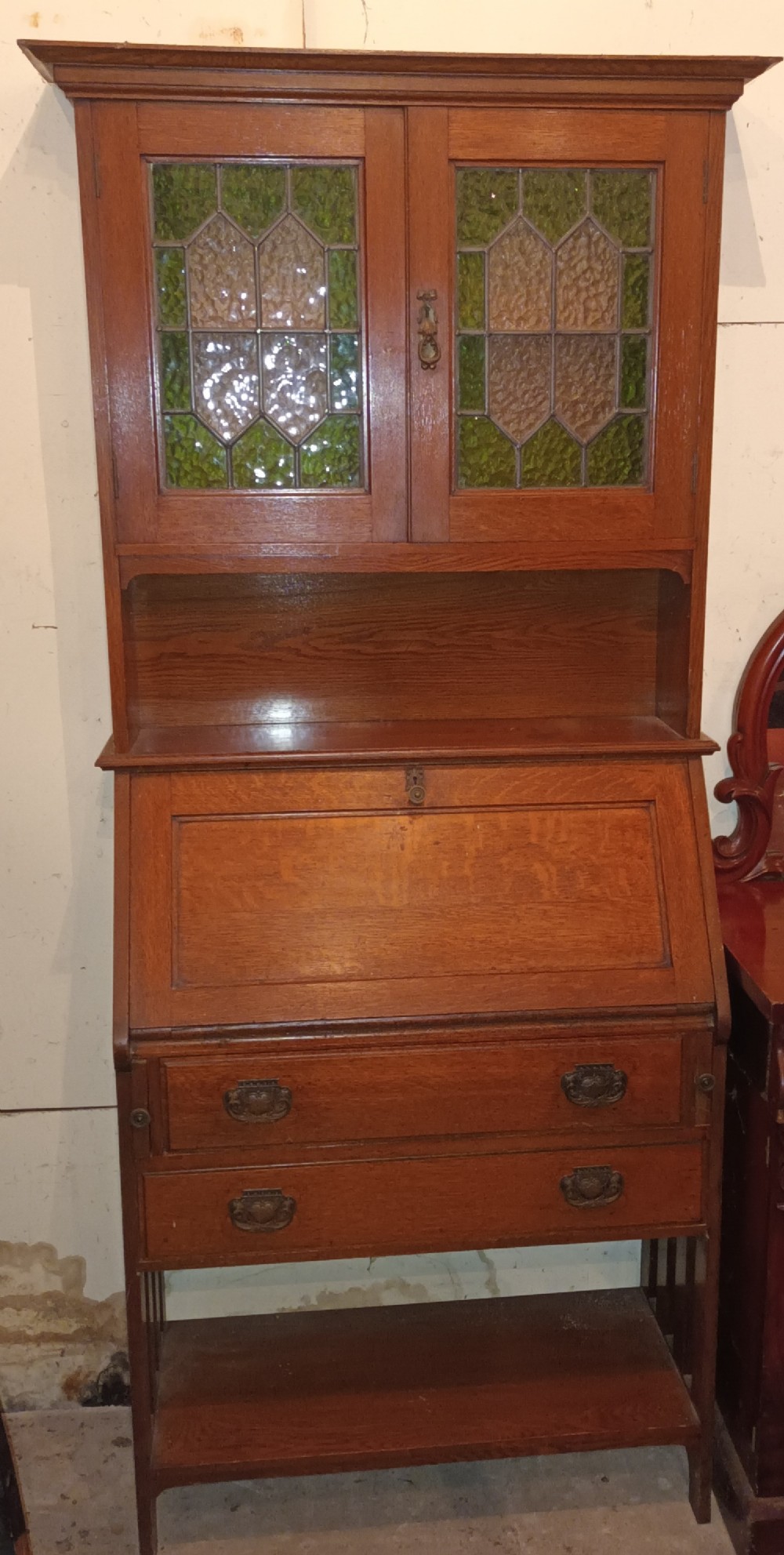 Edwardian oak arts and crafts bureau bookcase. 
