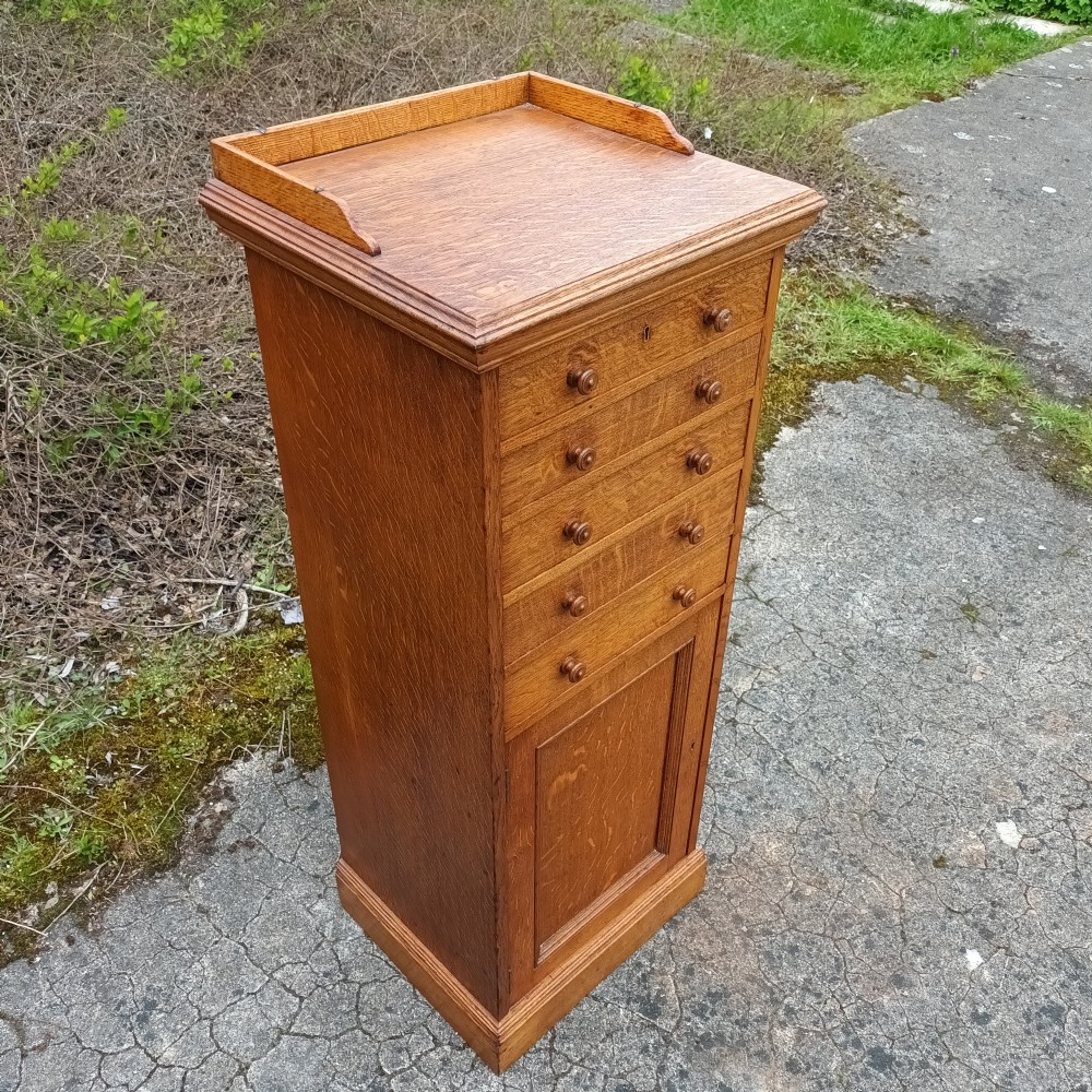Useful late Victorian oak side cabinet  View III