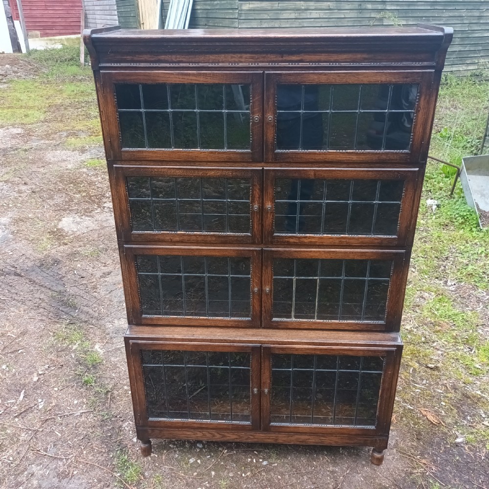 Oak 4 section leaded glazed in the manner of Minty. View II