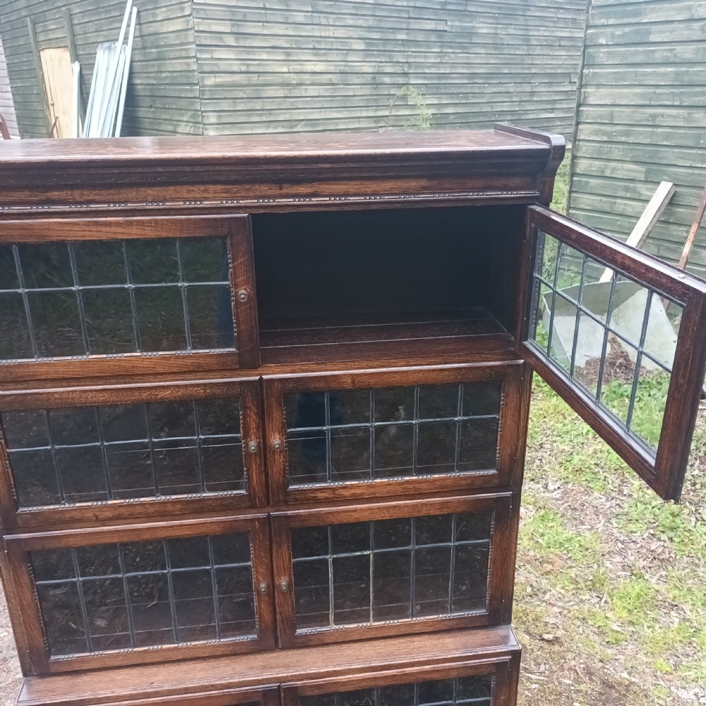 Oak 4 section leaded glazed in the manner of Minty. View III