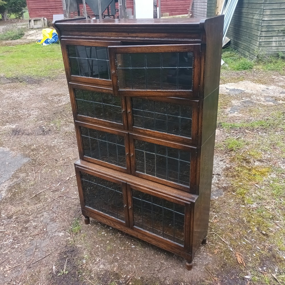 Oak 4 section leaded glazed in the manner of Minty. View VI