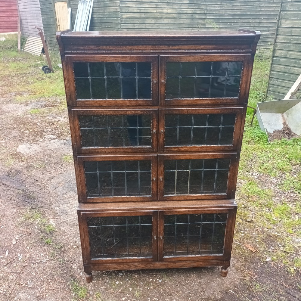 Oak 4 section leaded glazed in the manner of Minty. View VIII