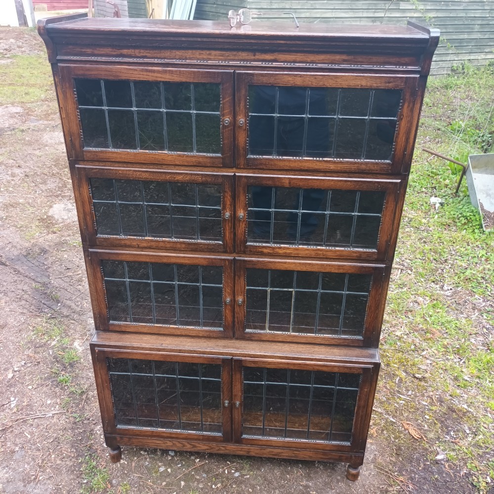Oak 4 section leaded glazed in the manner of Minty.
