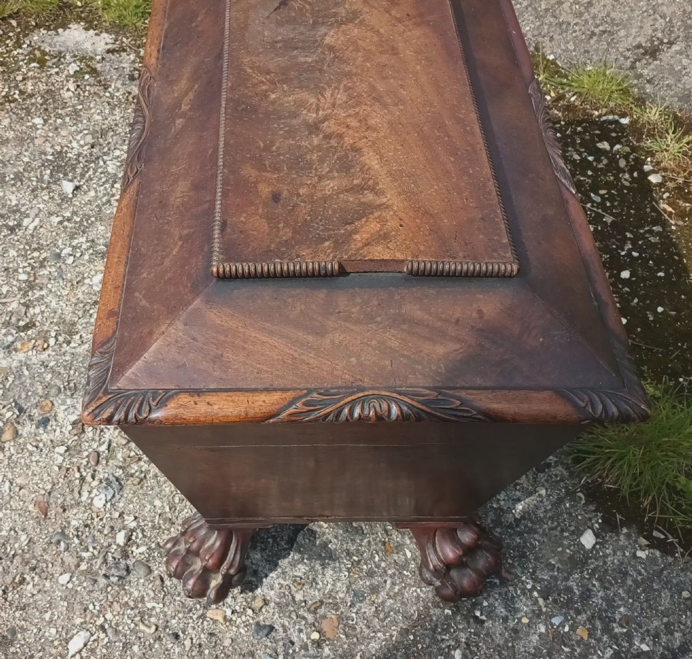 Regency mahogany Cellerette with good carved claw feet. View XII