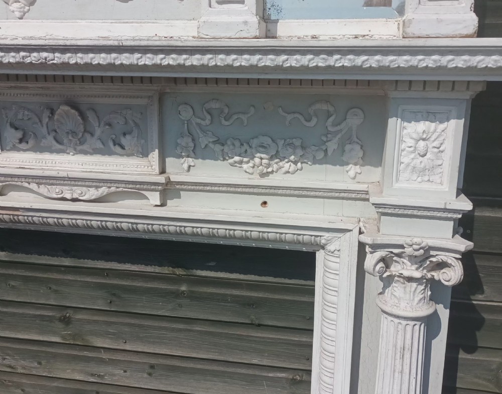 Painted fire surround and overmantel.  View VII