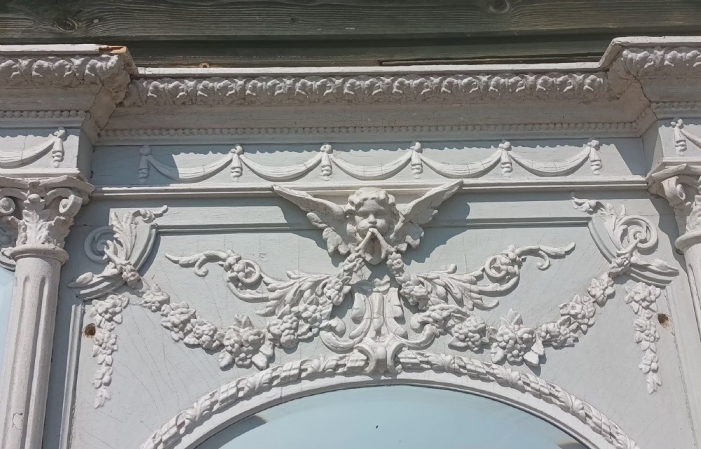 Painted fire surround and overmantel.  View VIII
