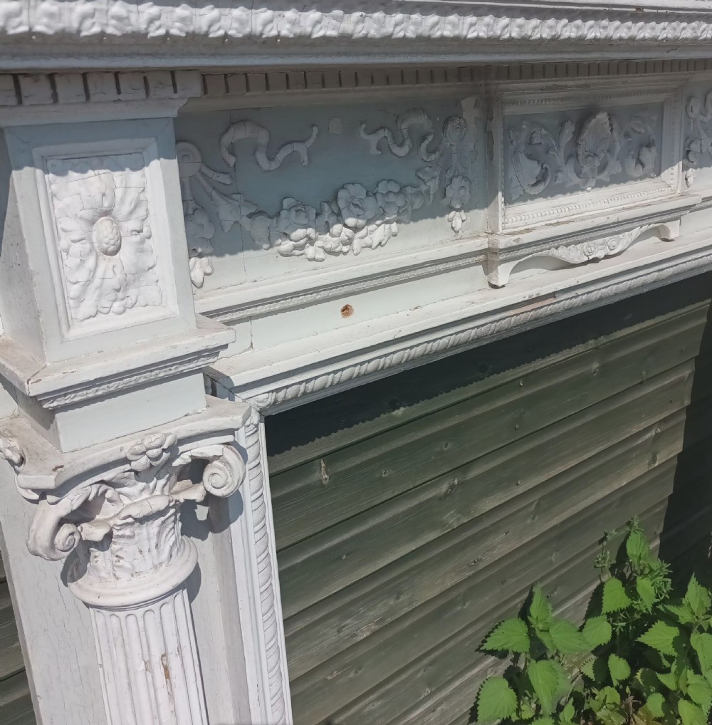 Painted fire surround and overmantel.  View XIII