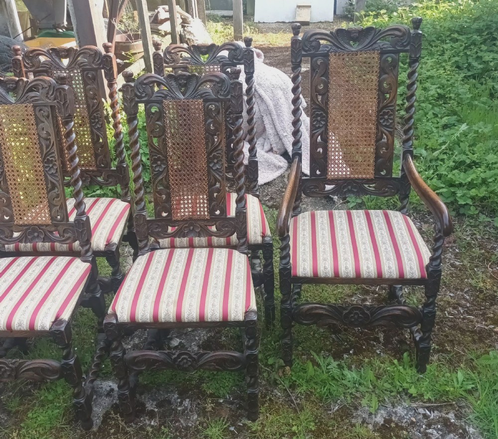 Set of 8 carved oak dining chairs. View V