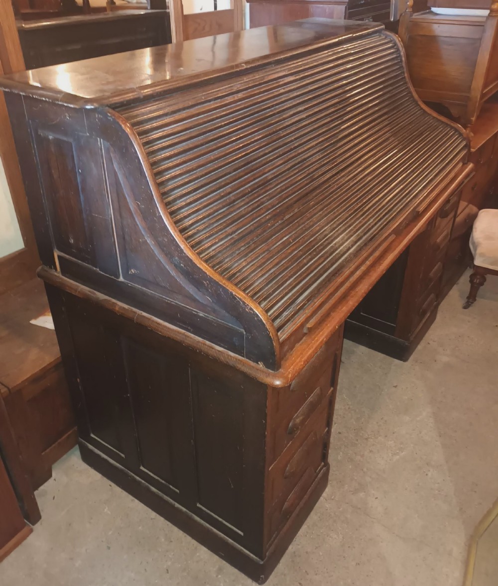 Large oak roll top pedestal desk. View III