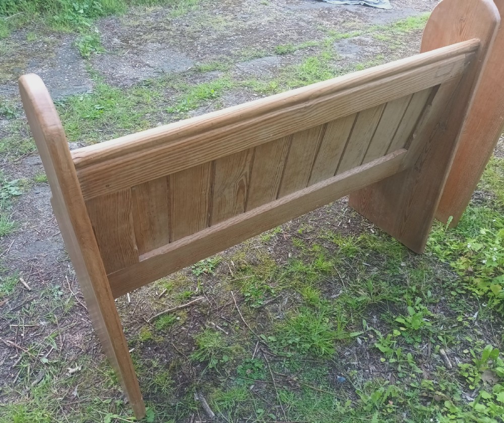 Pair of late Victorian pitch pine kitchen pews with loose cushions.  View V