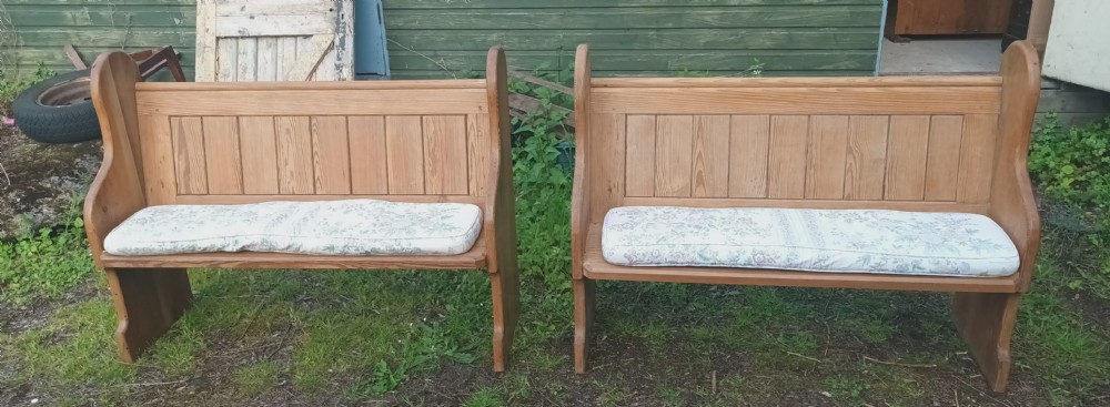 Pair of late Victorian pitch pine kitchen pews with loose cushions.  View VII