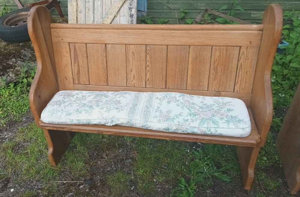 Pair of late Victorian pitch pine kitchen pews with loose cushions.  View VIII