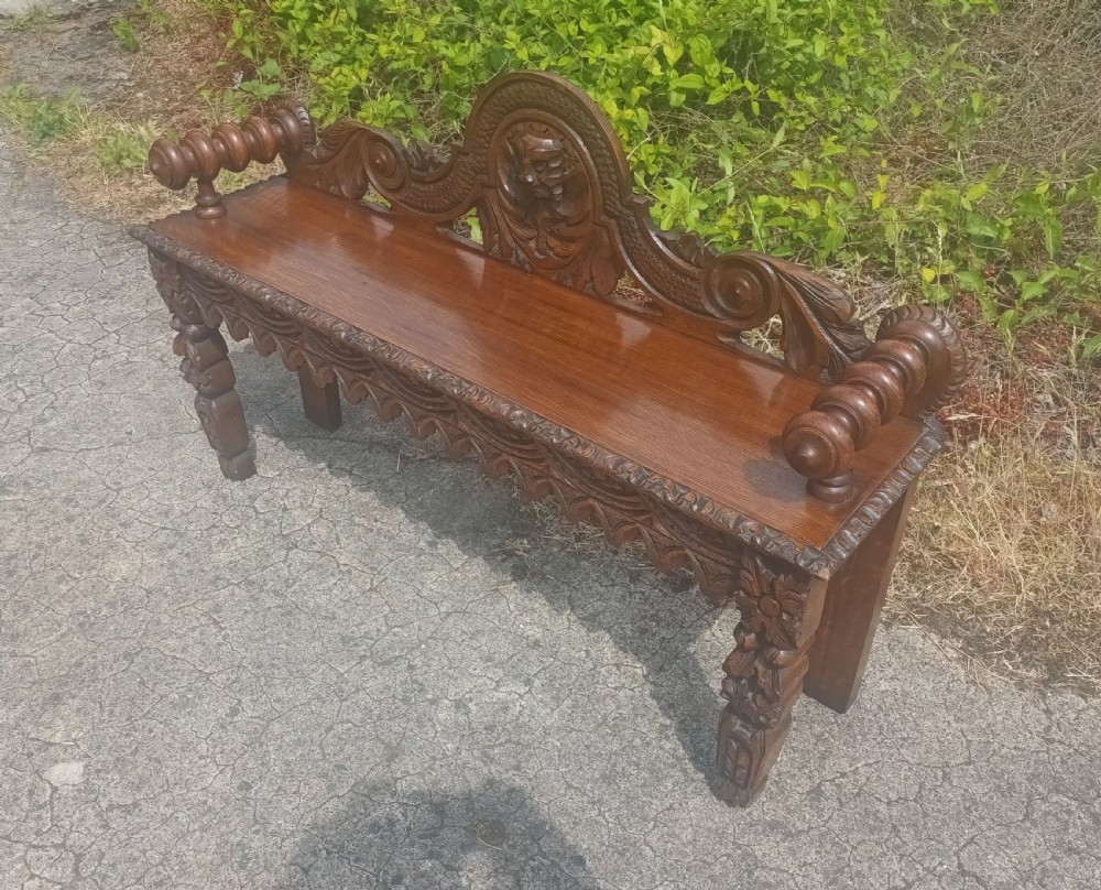 Victorian carved oak hall bench. View IV