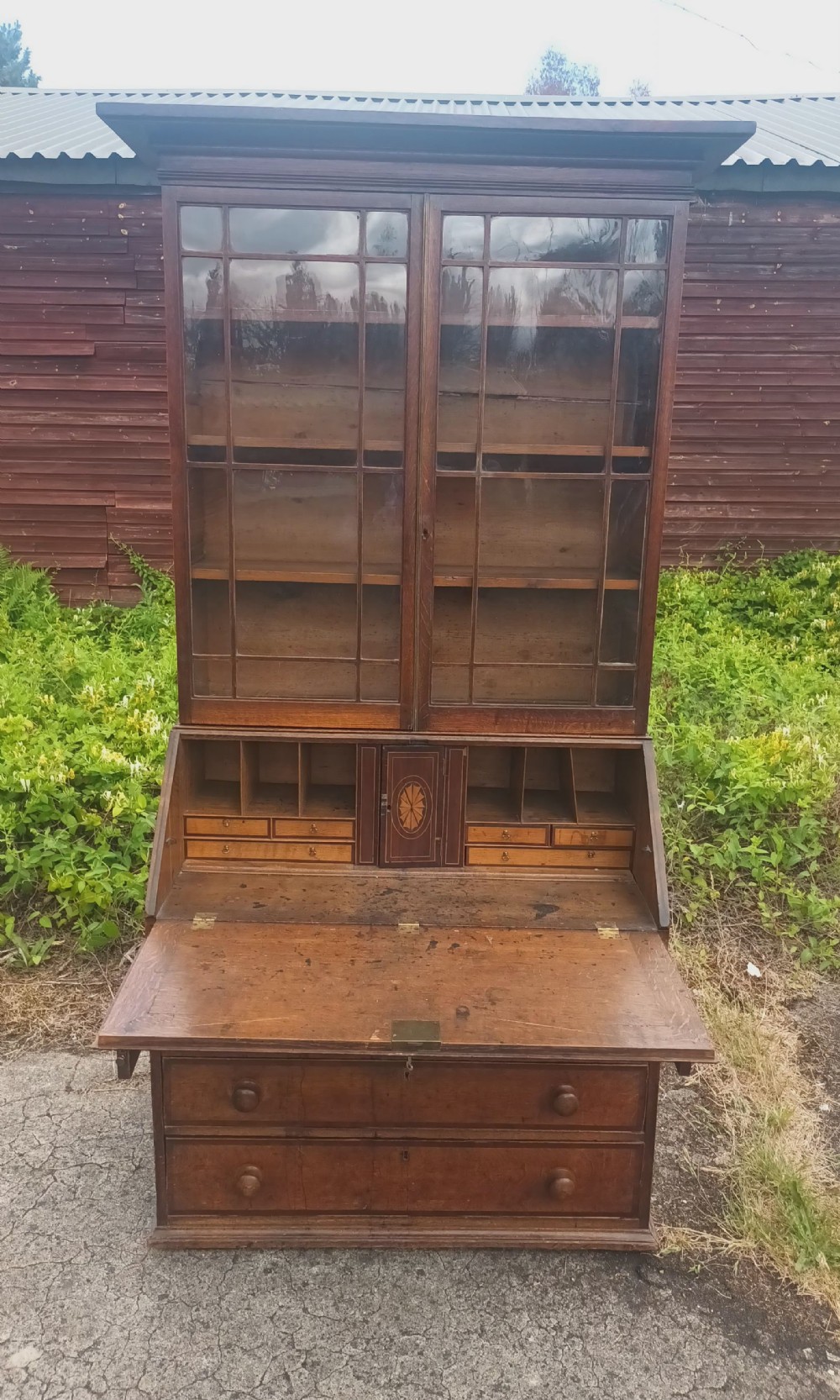 Late Georgian oak bureau bookcase. 