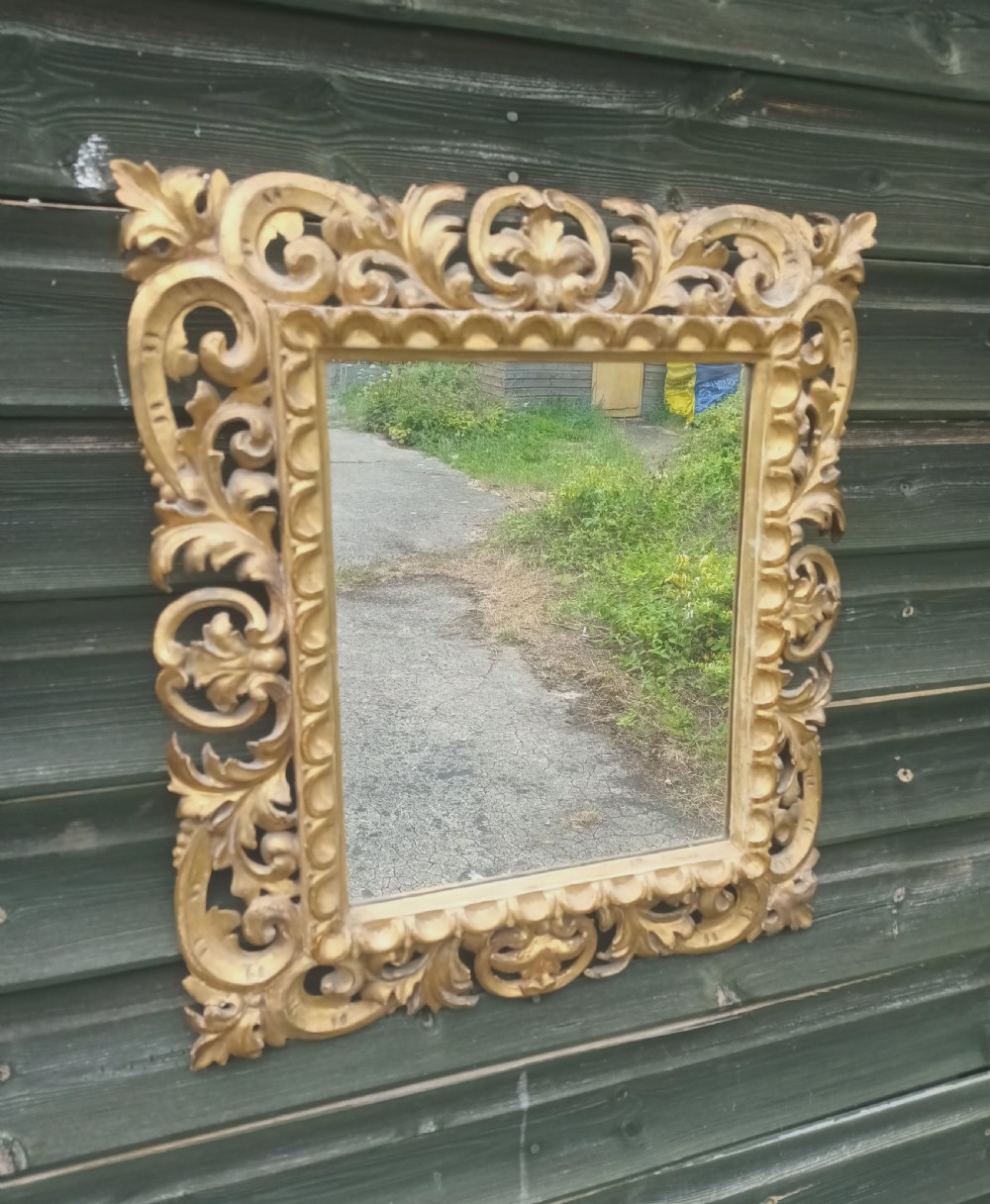 Carved Gilt frame wall mirror.  View IV