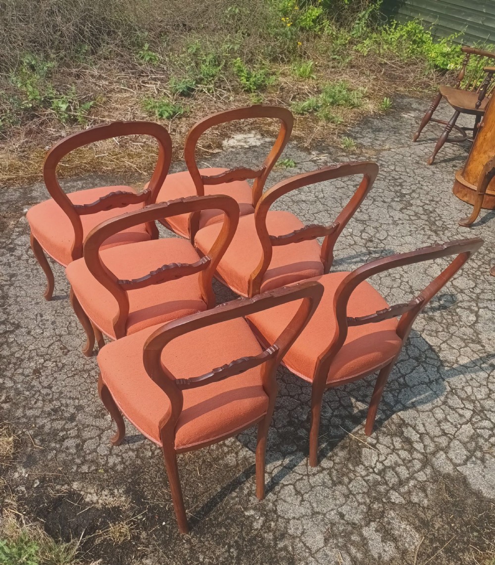 Set of 6 late Victorian walnut balloon back chairs. View III