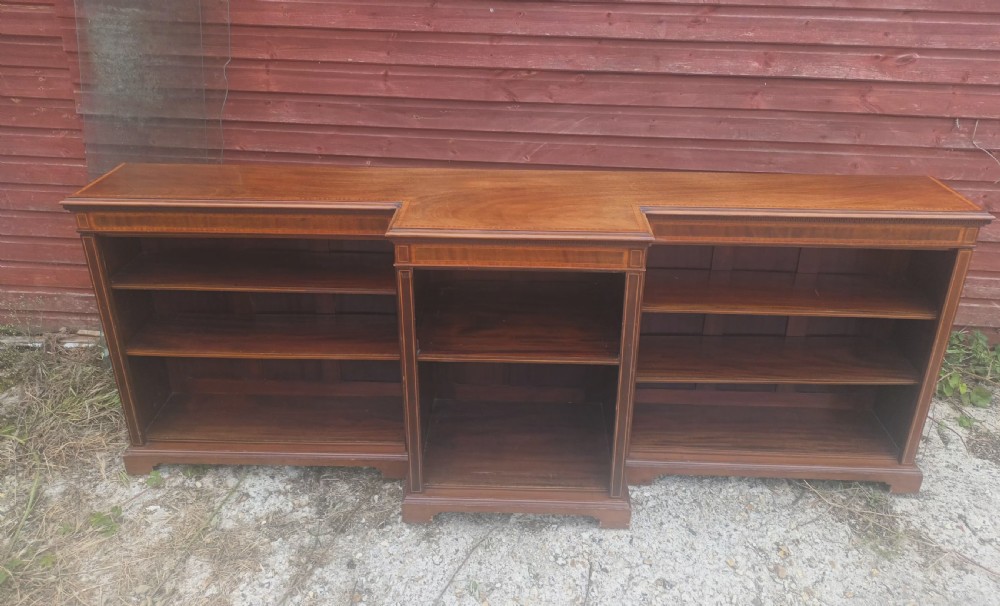 Edwardian inlaid mahogany breakfront open bookcase. 