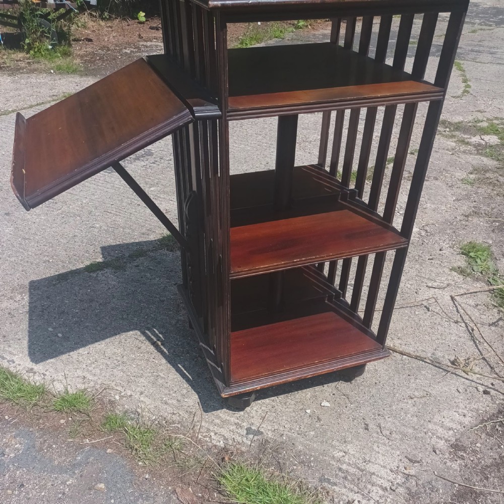 Early 20th century revolving bookcase with adjustable reading slope. View VI