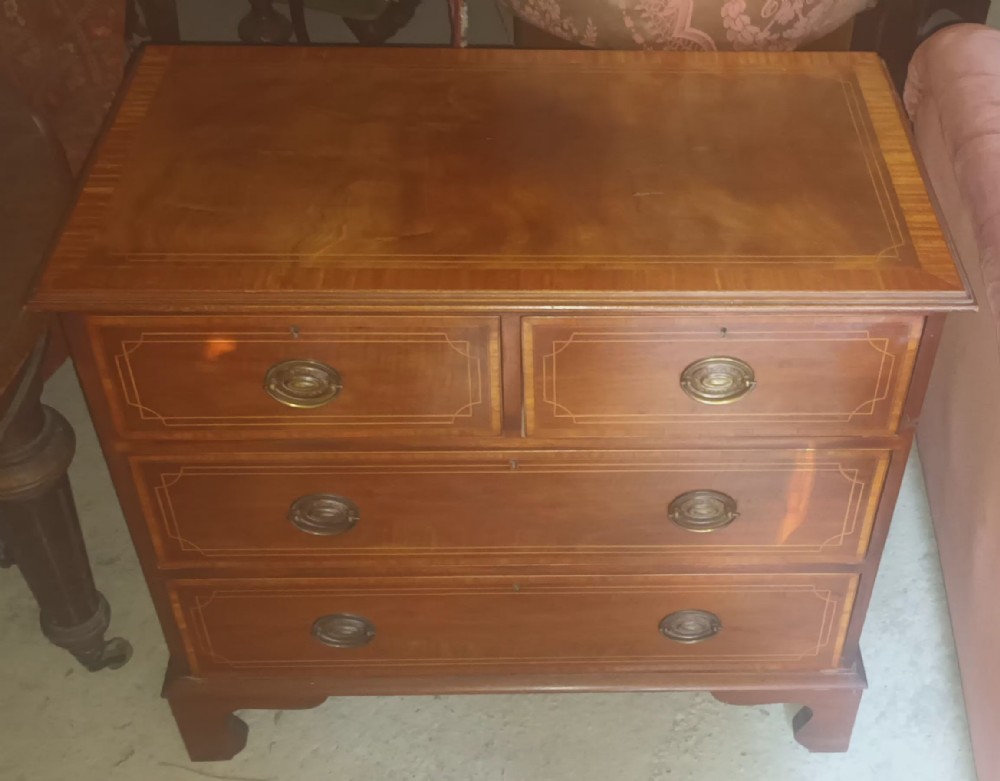 Small 19th century inlaid mahogany chest of drawers. 