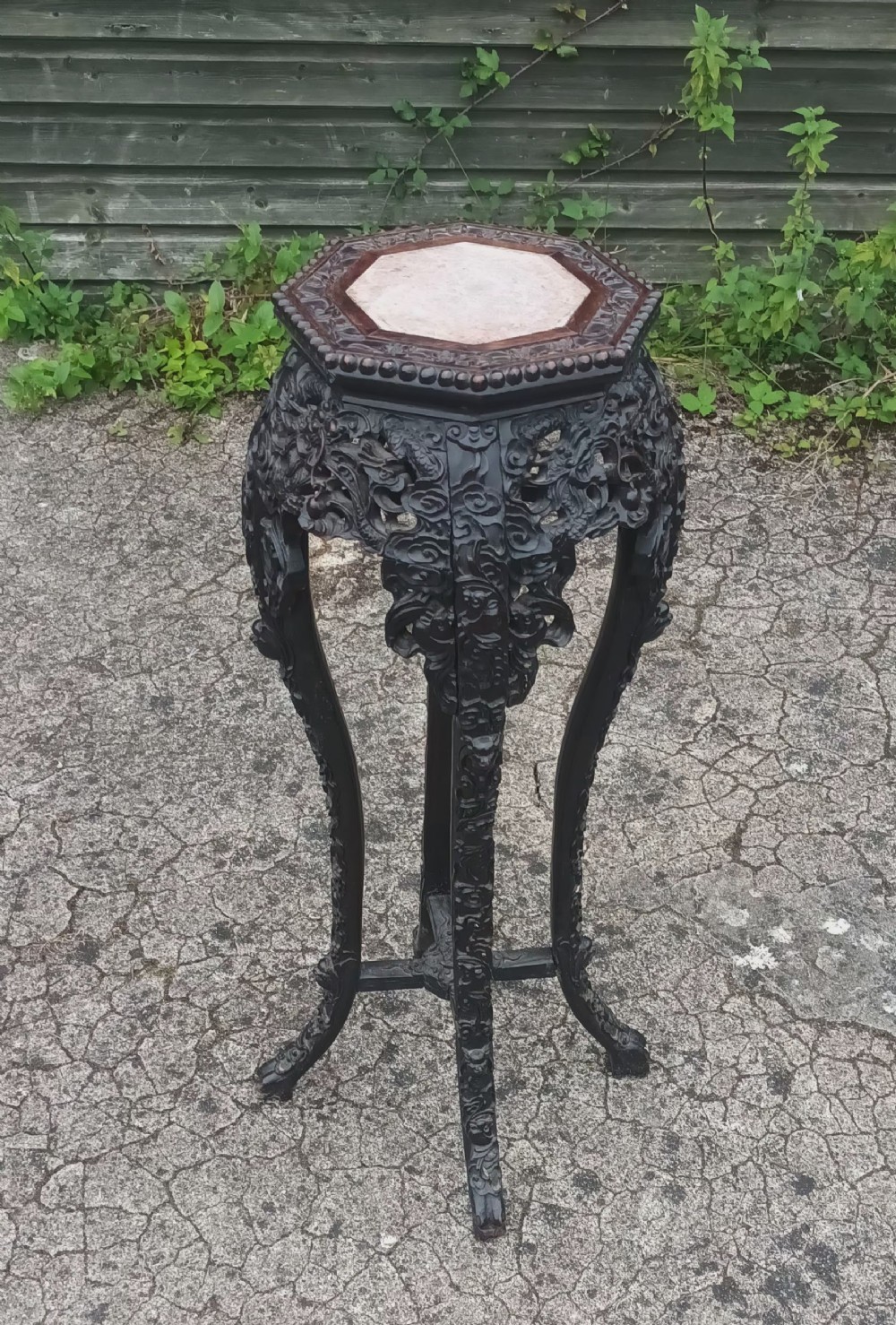 Late 19th century carved hardwood marble top stand.