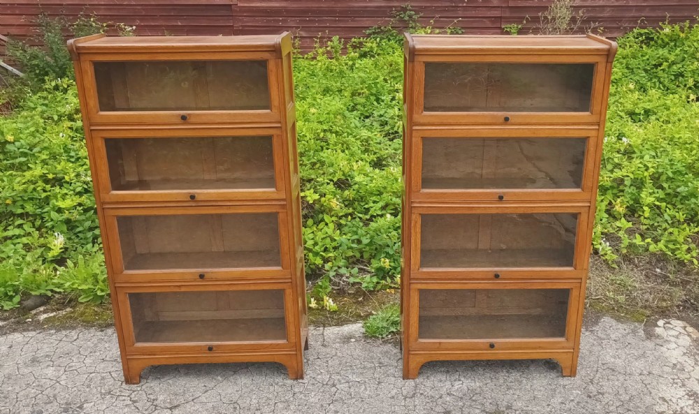 Pair of oak Globe Wernicke style 4 section bookcases View II