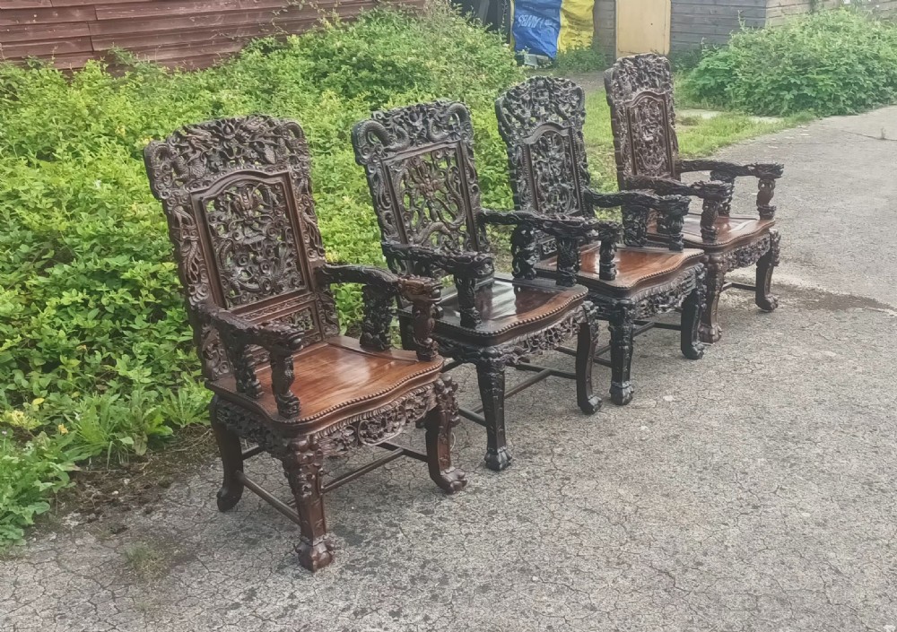 4 carved Chinese hardwood armchairs  View V