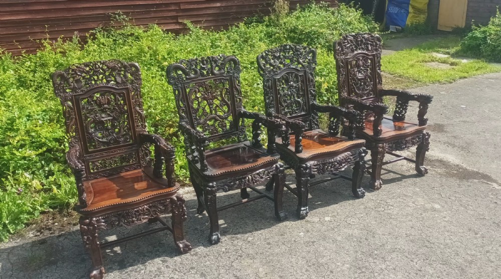 4 carved Chinese hardwood armchairs  View VII