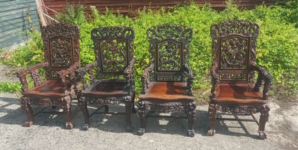 4 carved Chinese hardwood armchairs  View VIII