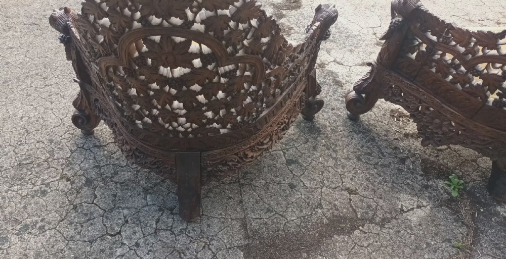 Pair of late 19th century Anglo Indian carved armchairs.  View VII