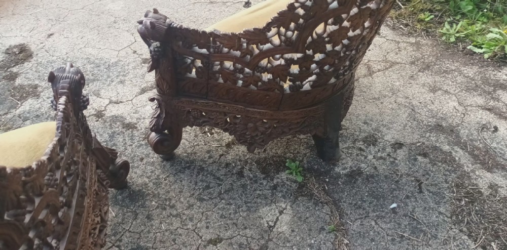 Pair of late 19th century Anglo Indian carved armchairs.  View VIII