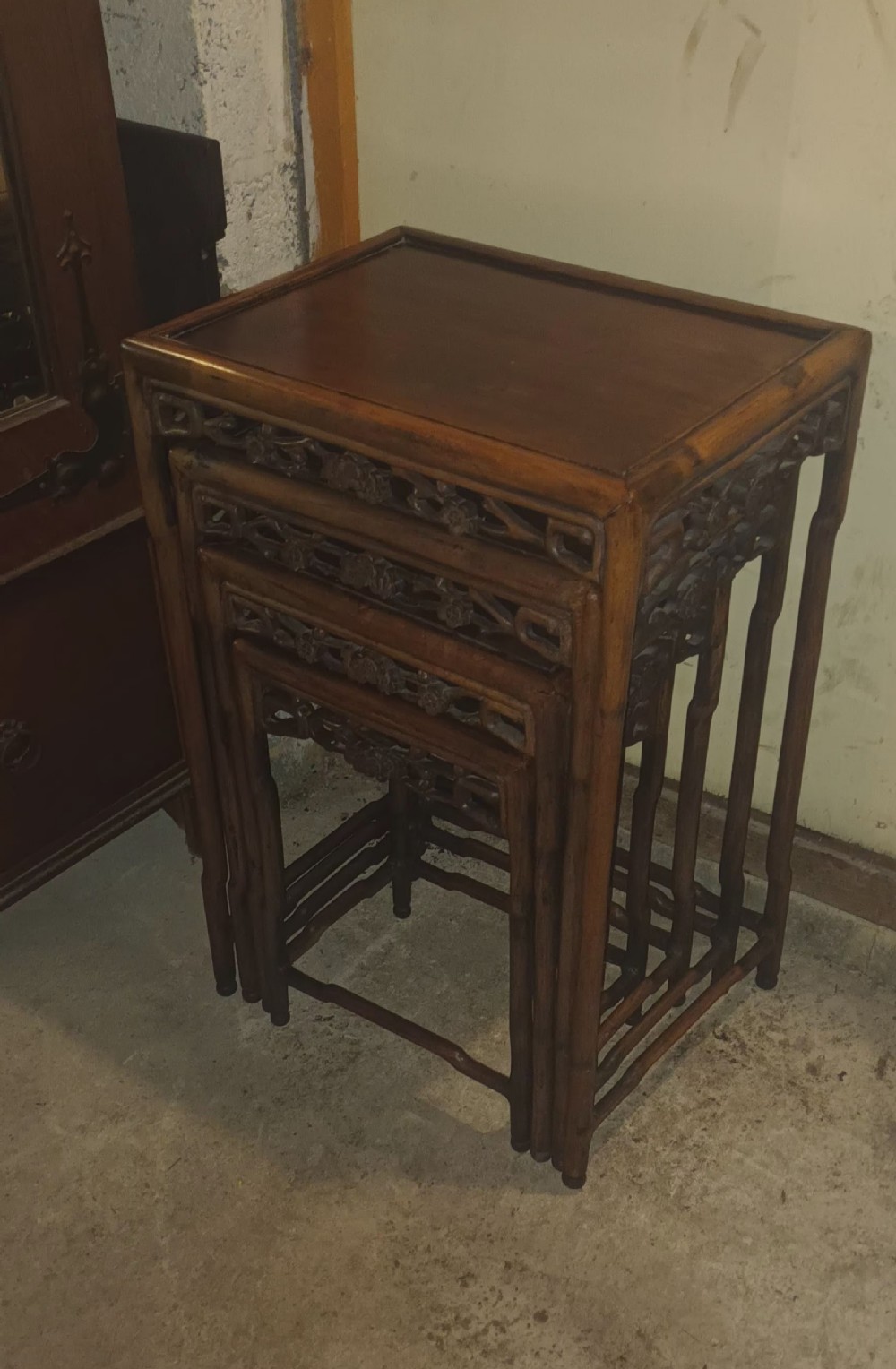Nest of 4 carved Chinese tables