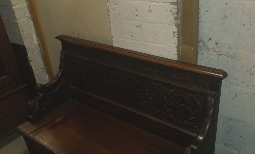 Late Victorian carved oak hall seat. View V