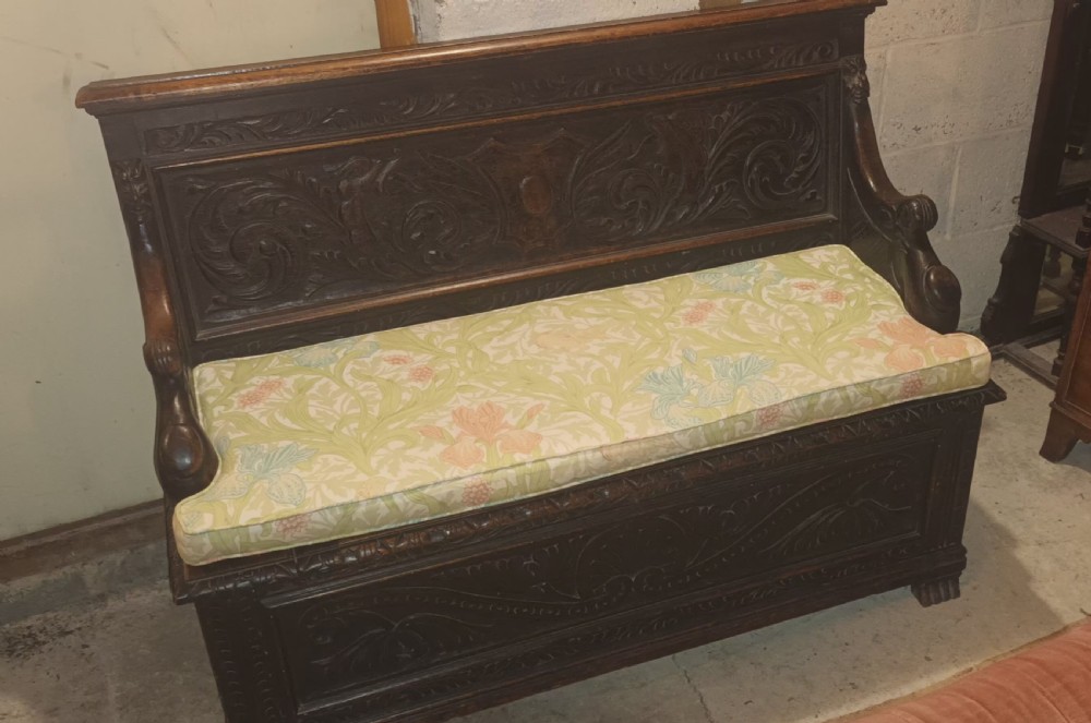Late Victorian carved oak hall seat. View VIII