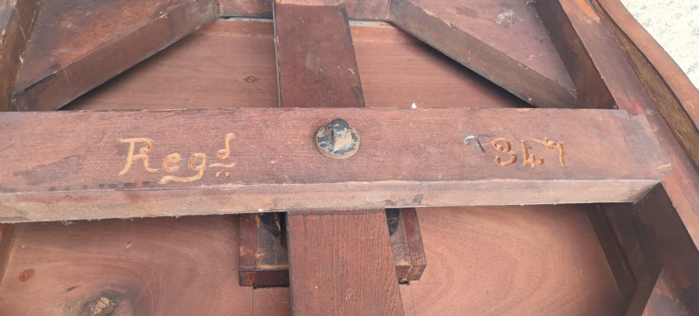 Edwardian mahogany revolving bookcase. With Registration mark underneath.  View IX