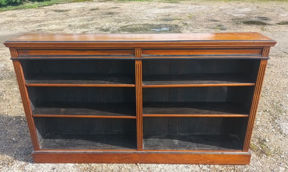 Late Victorian walnut bookcase with ebonised mouldings View II